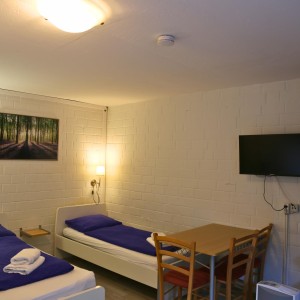 Manon 4: DZ Economy Zimmer mit Gemeinschaftsbad